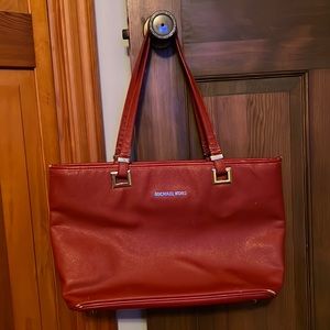 Red large Michael kors purse with gold hardware